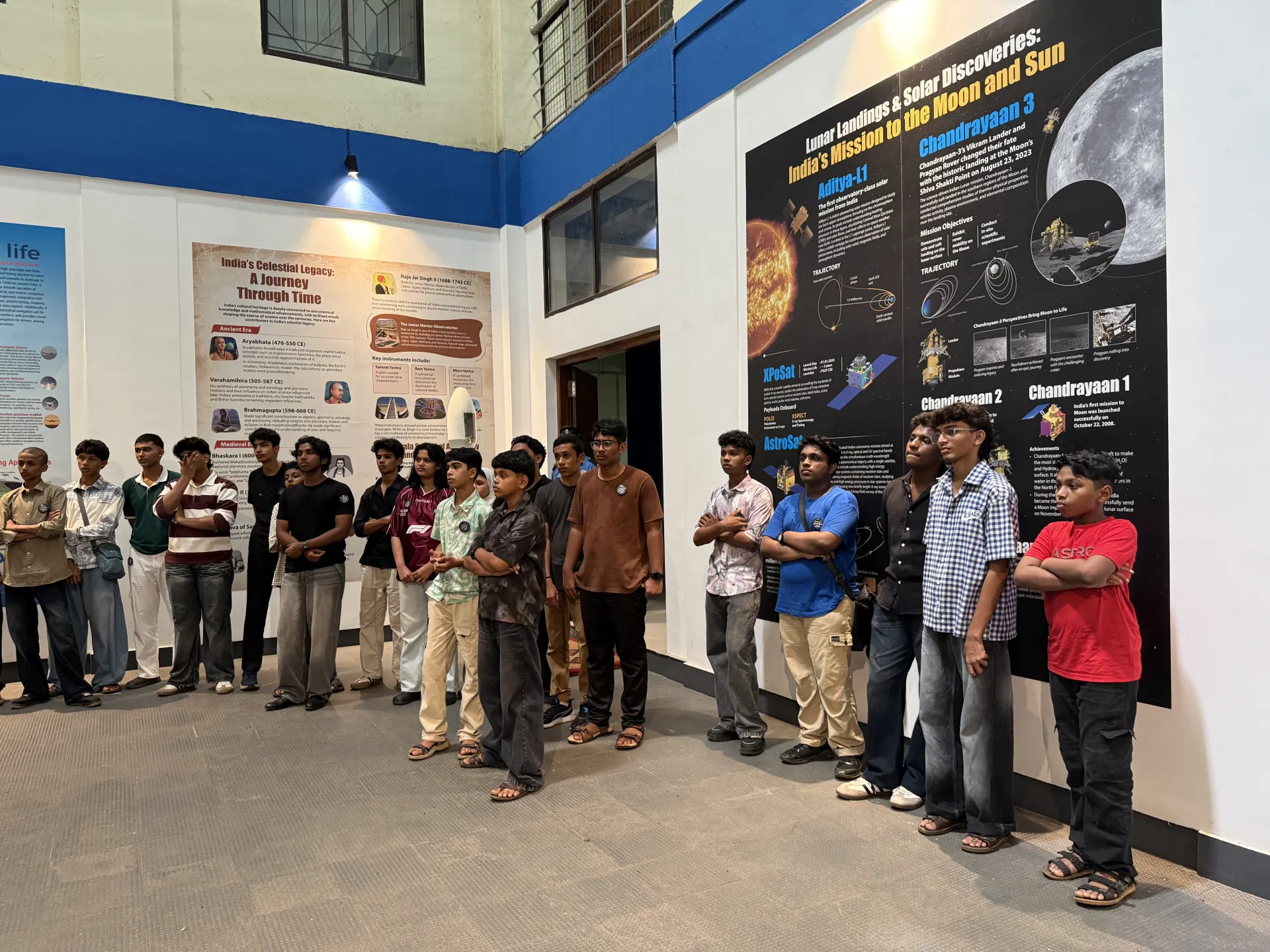 Students on a space-research exhibit tour at NIT Calicut